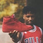 Man Holding Fake Nike Shoe